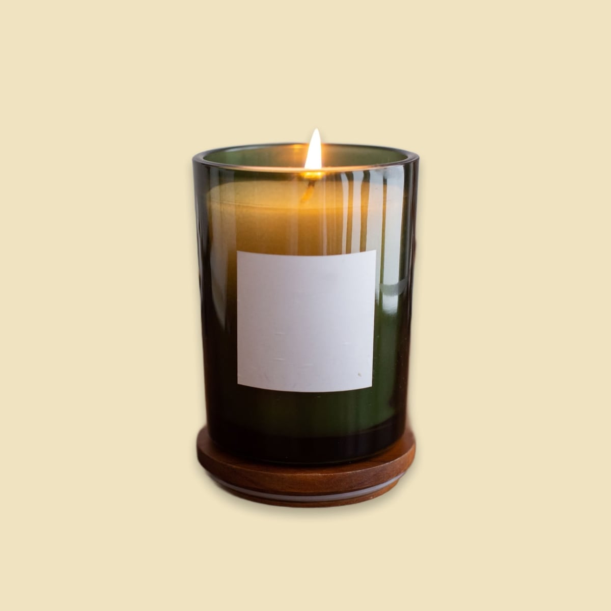 Candle in green glass, colour field scene