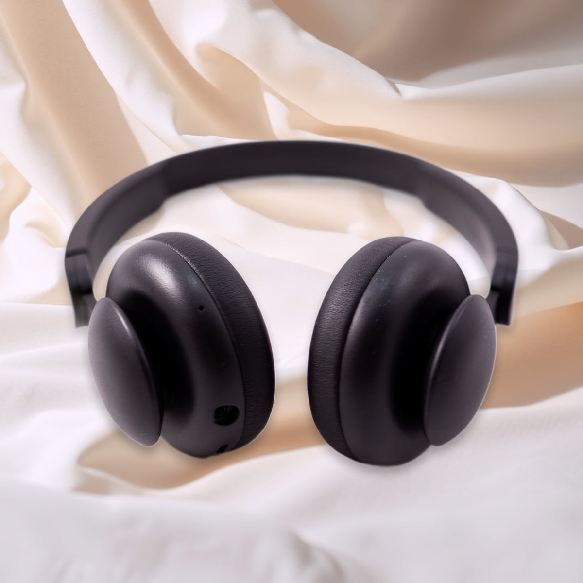 Over-ear headphones, linen scene